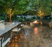 outdoor area with bar stools and bar