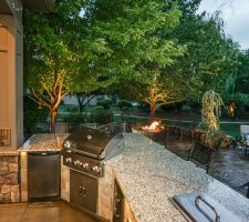 outdoor living area with kitchen